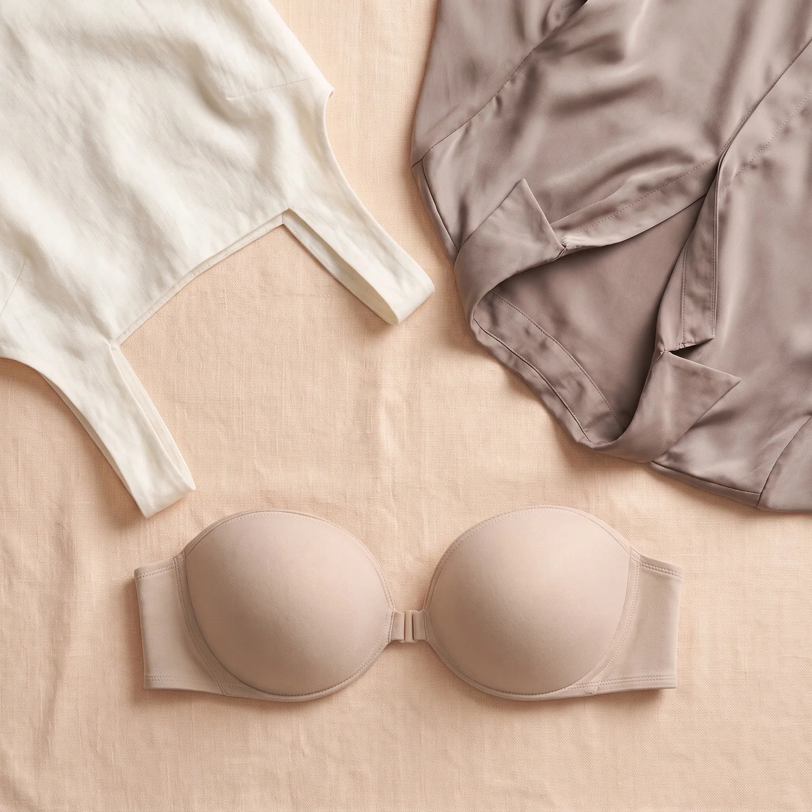 One beige bra arranged with two possible clothing pairings